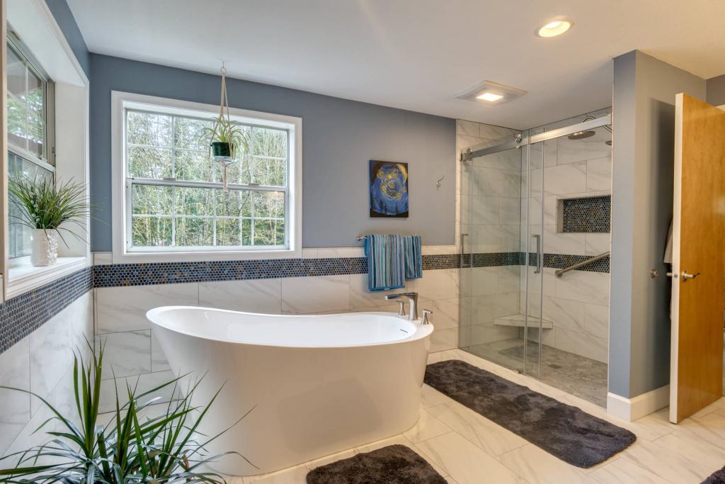 White Tile Bathroom Carrara Marble and Soaking Tub